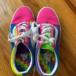 Size 7.5 Women’s Vans. Never worn.